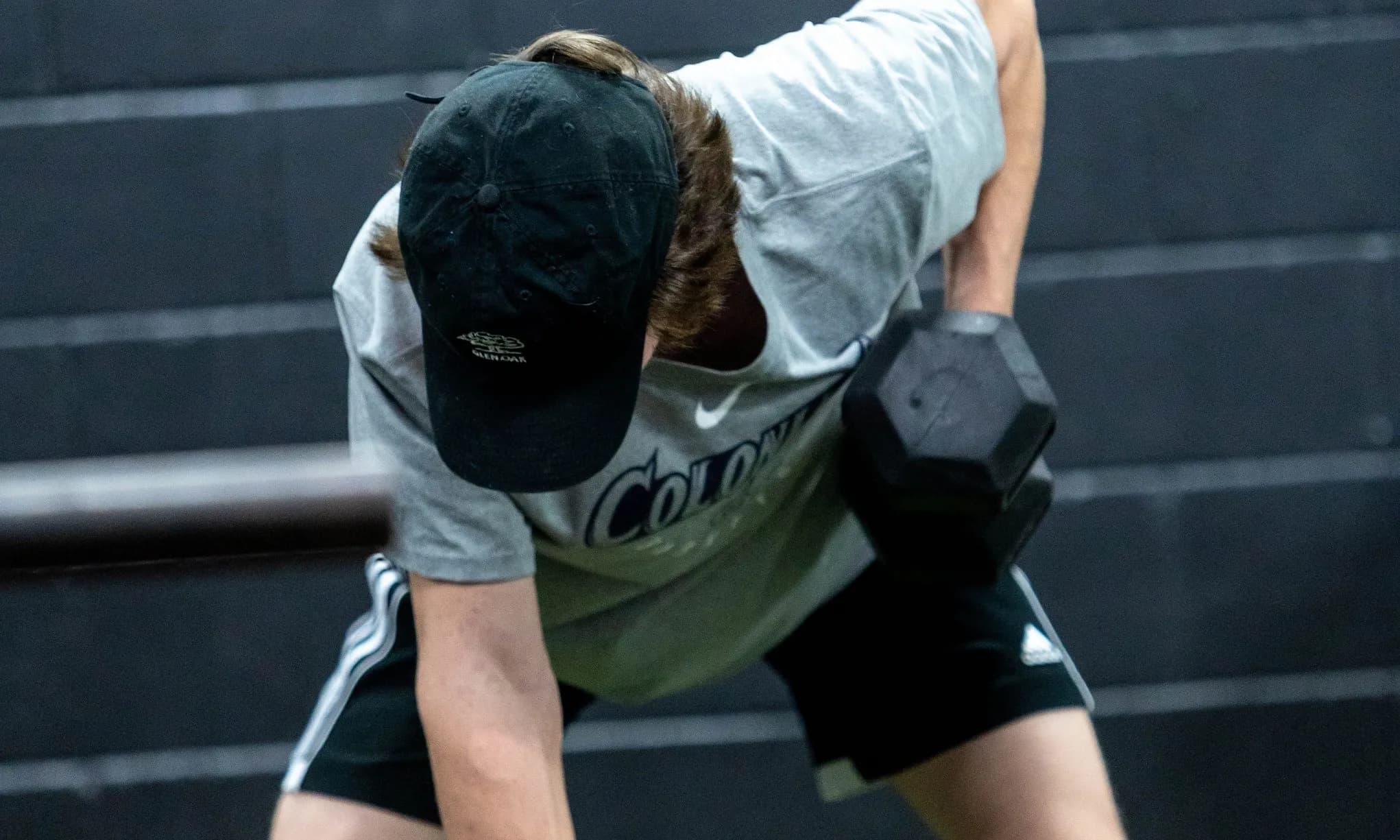 A NEPA Fit Club athlete training with dumbbells